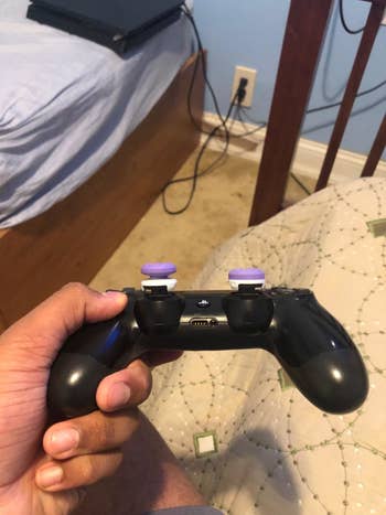 Side view of the thumbsticks showing the mixed height