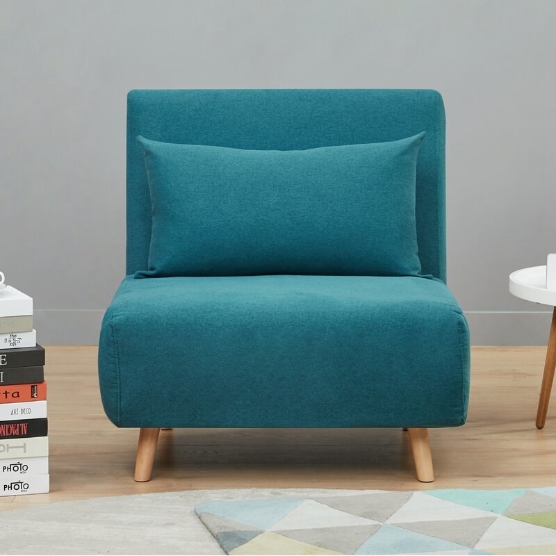 The teal accent chair 