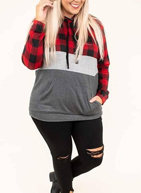 plus size model wearing pullover sweatshirt with buffalo check plaid and gray on it 