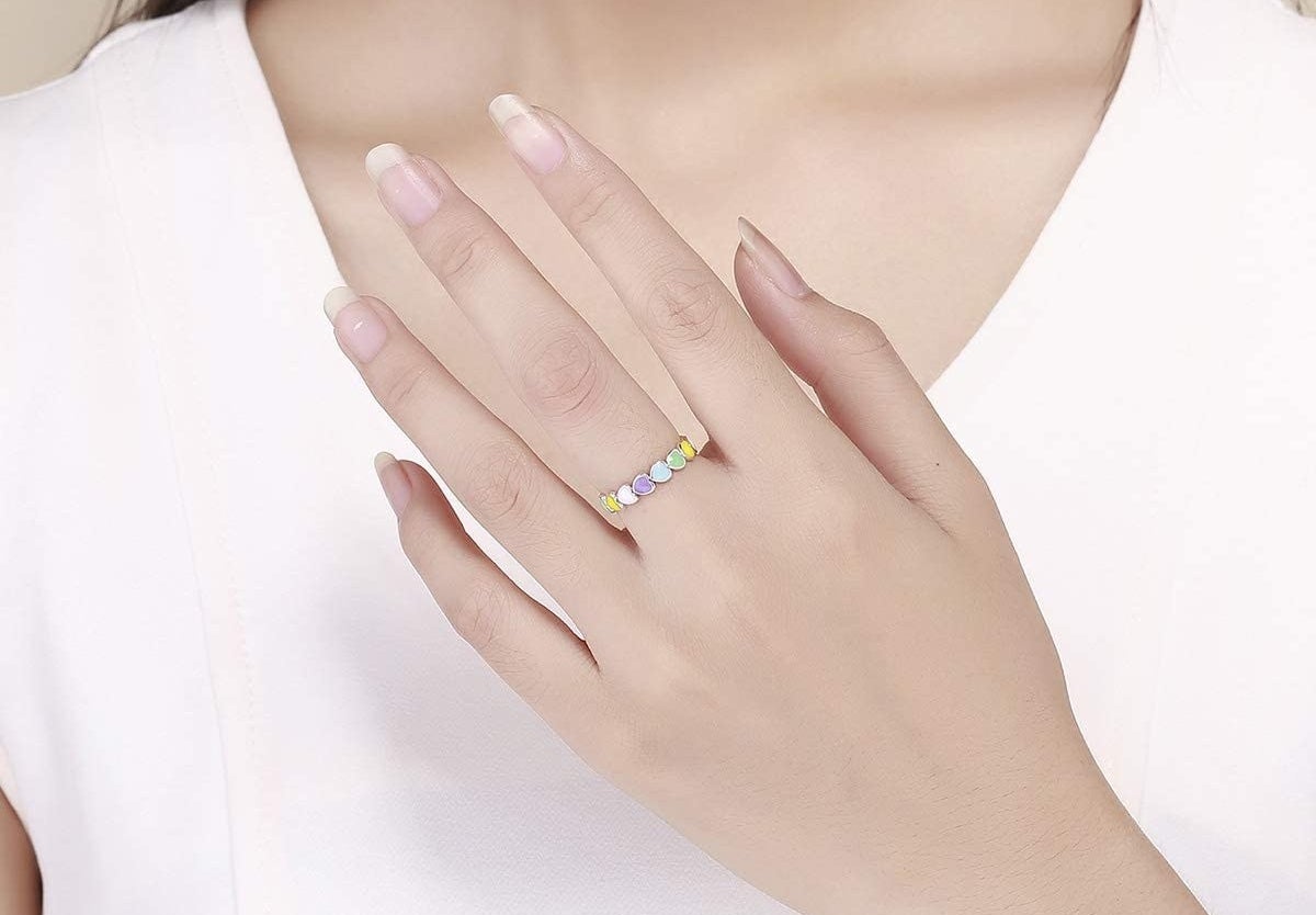 Ring with colorful rainbow hearts encircling it
