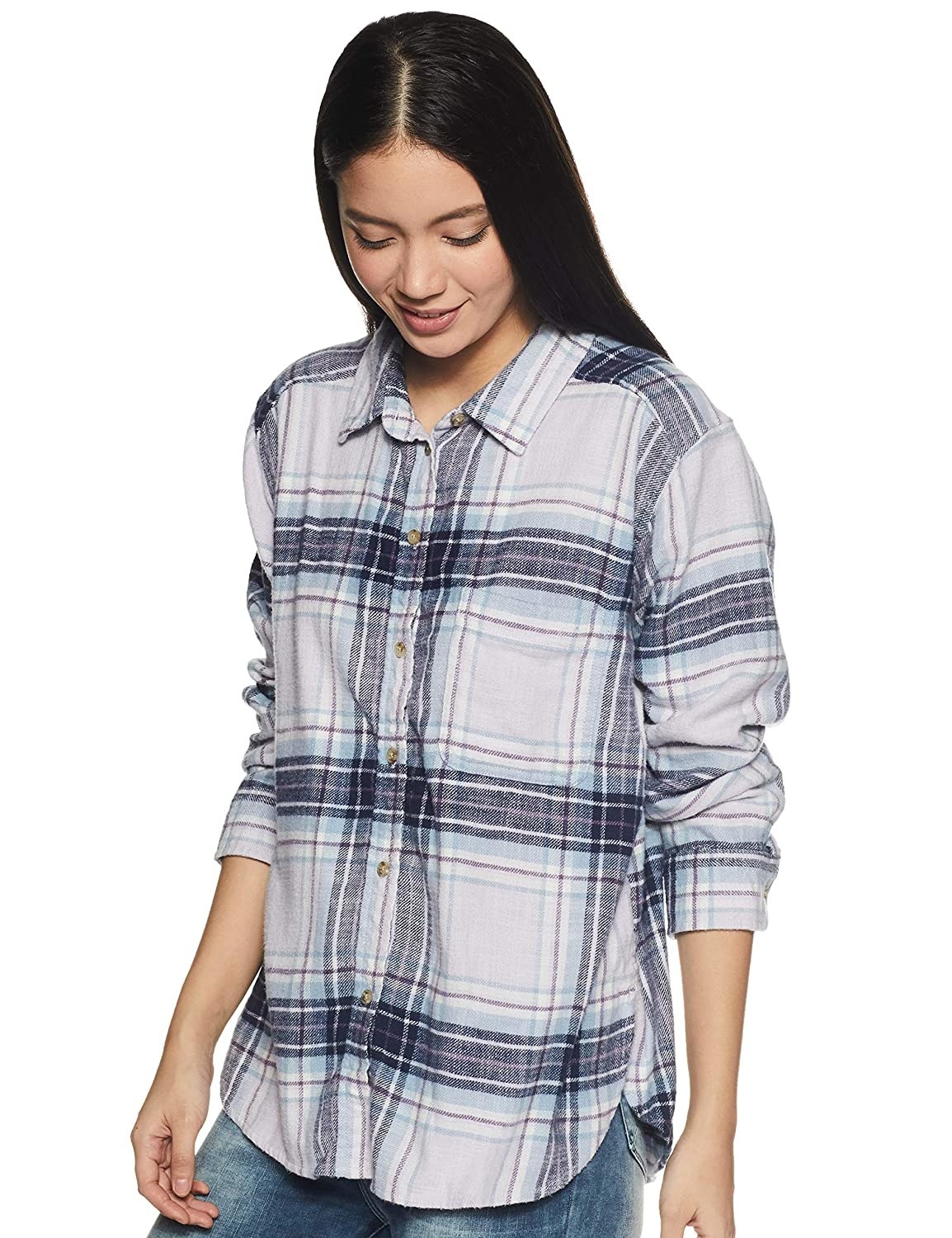 A model wearing a blue and white flannel shirt with broad checkers.
