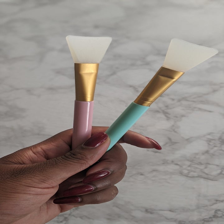 Kaysey holding the two applicators