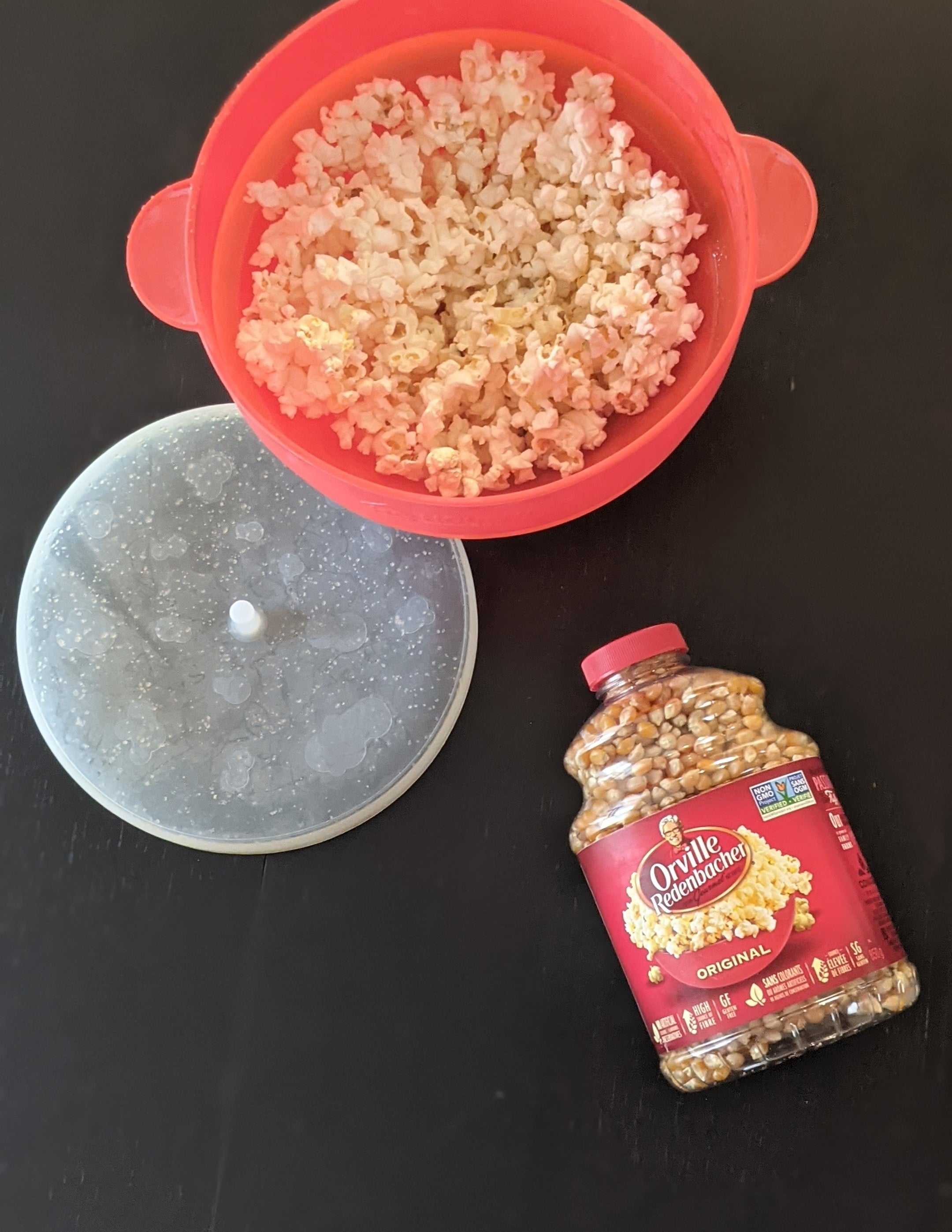 The silicone popcorn maker filled with delicious looking popcorn