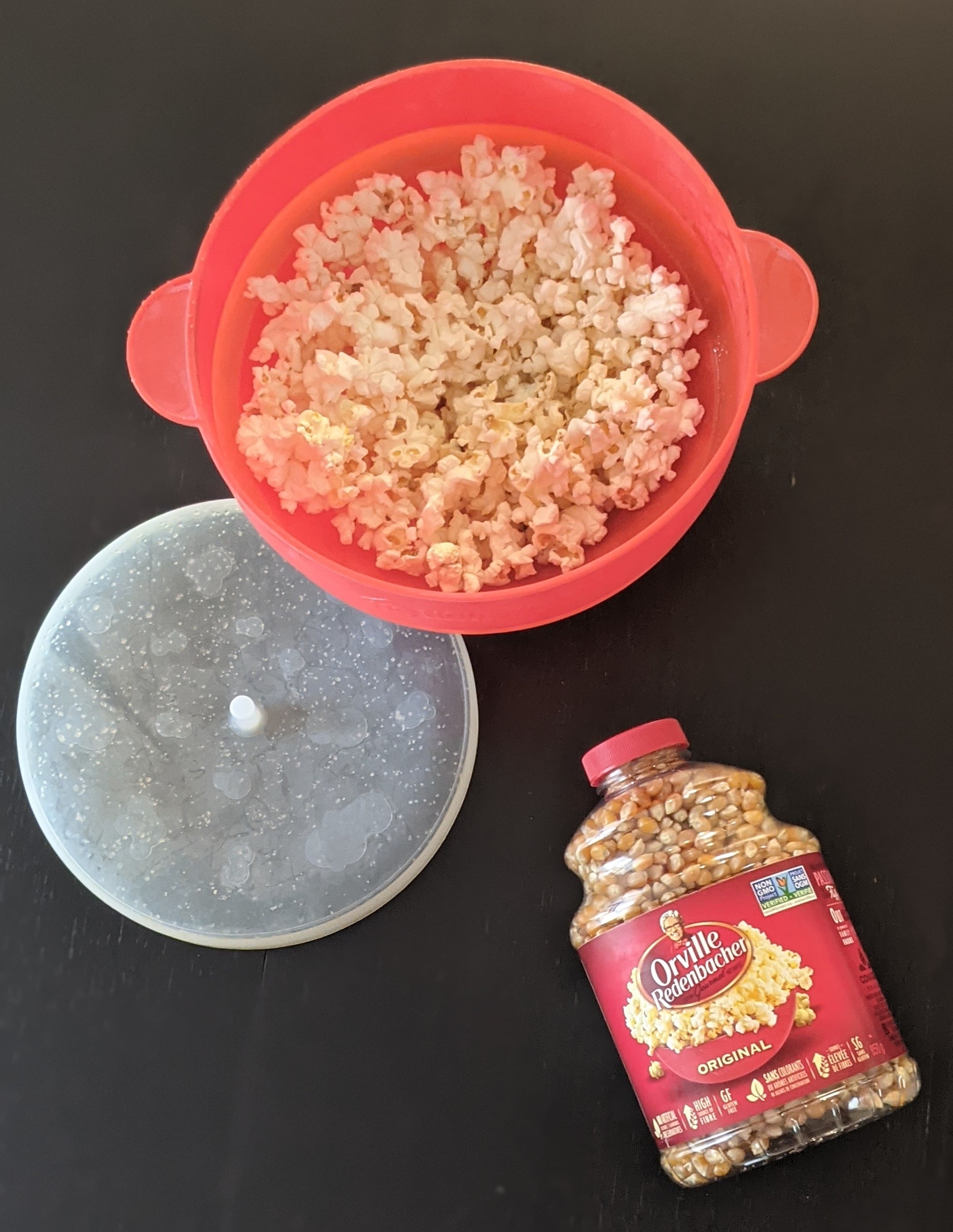 The silicone popcorn maker filled with delicious looking popcorn