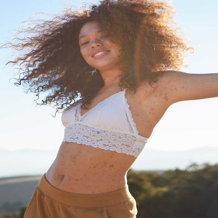 a model in a long sleeve striped top