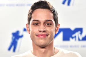 Pete Davidson wearing a Dead Presidents t-shirt and smiling