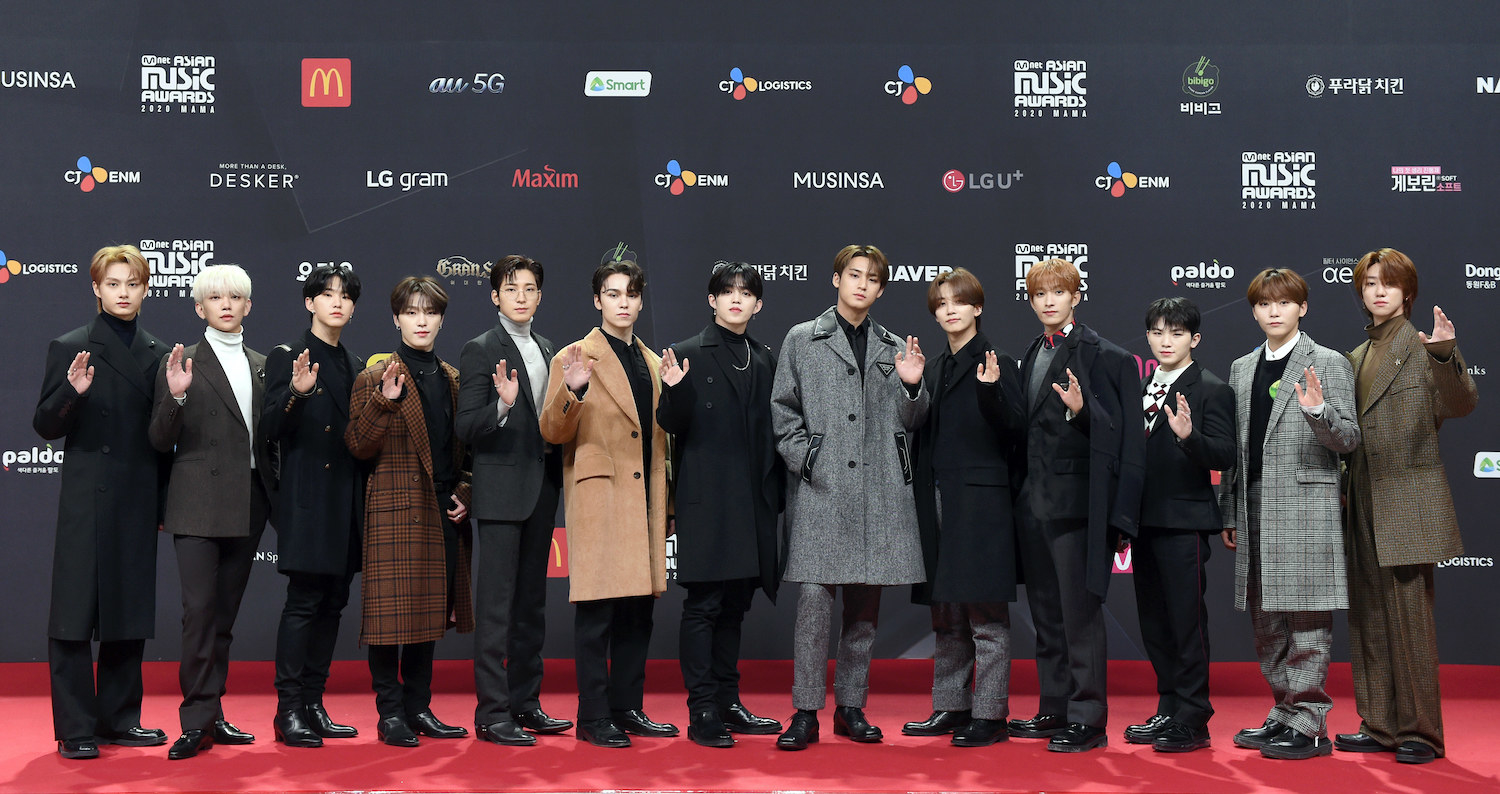 Seventeen, wearing blazers and long coats, attends the 2020 Mnet Asian Music Awards