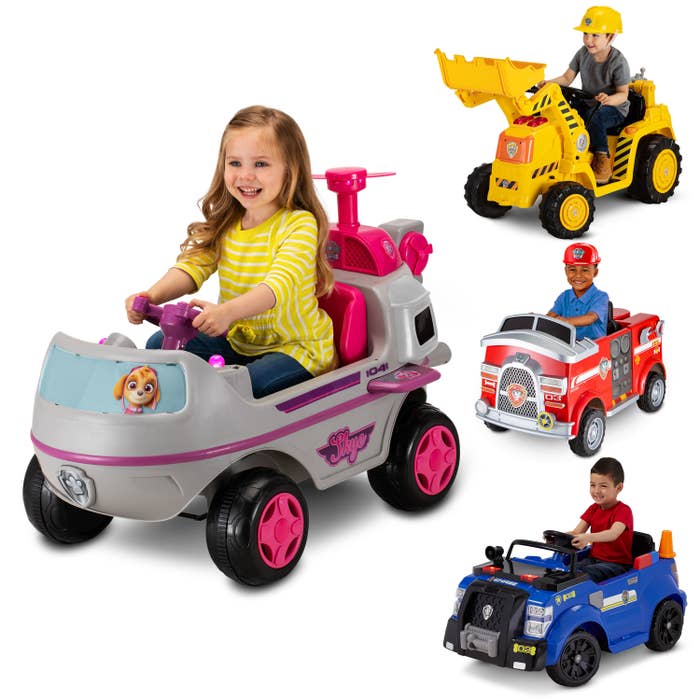 Children riding in the brightly colored cars