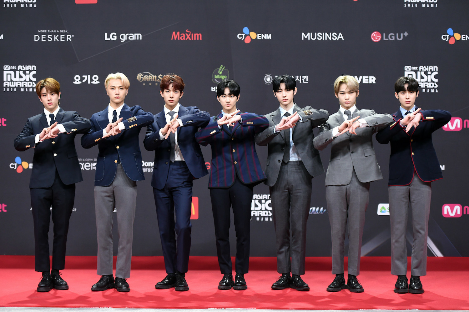 Enhypen, wearing suits, attends the 2020 Mnet Asian Music Awards