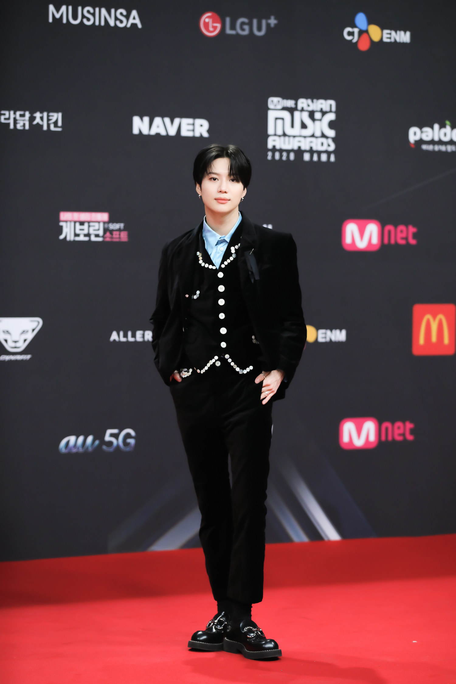 Taemin, wearing a velvet suiit, attends the 2020 Mnet Asian Music Awards