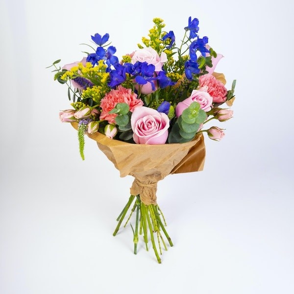bouquet with pink roses and other colorful flowers