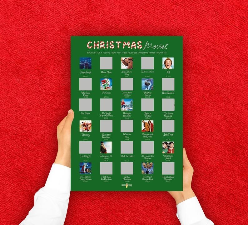 the green poster with scratch-off squares filled with holiday movies