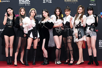 Twice poses together on the red carpet