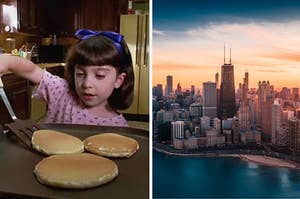 Matilda is on the left flipping pancakes with a Chicago city view on the right