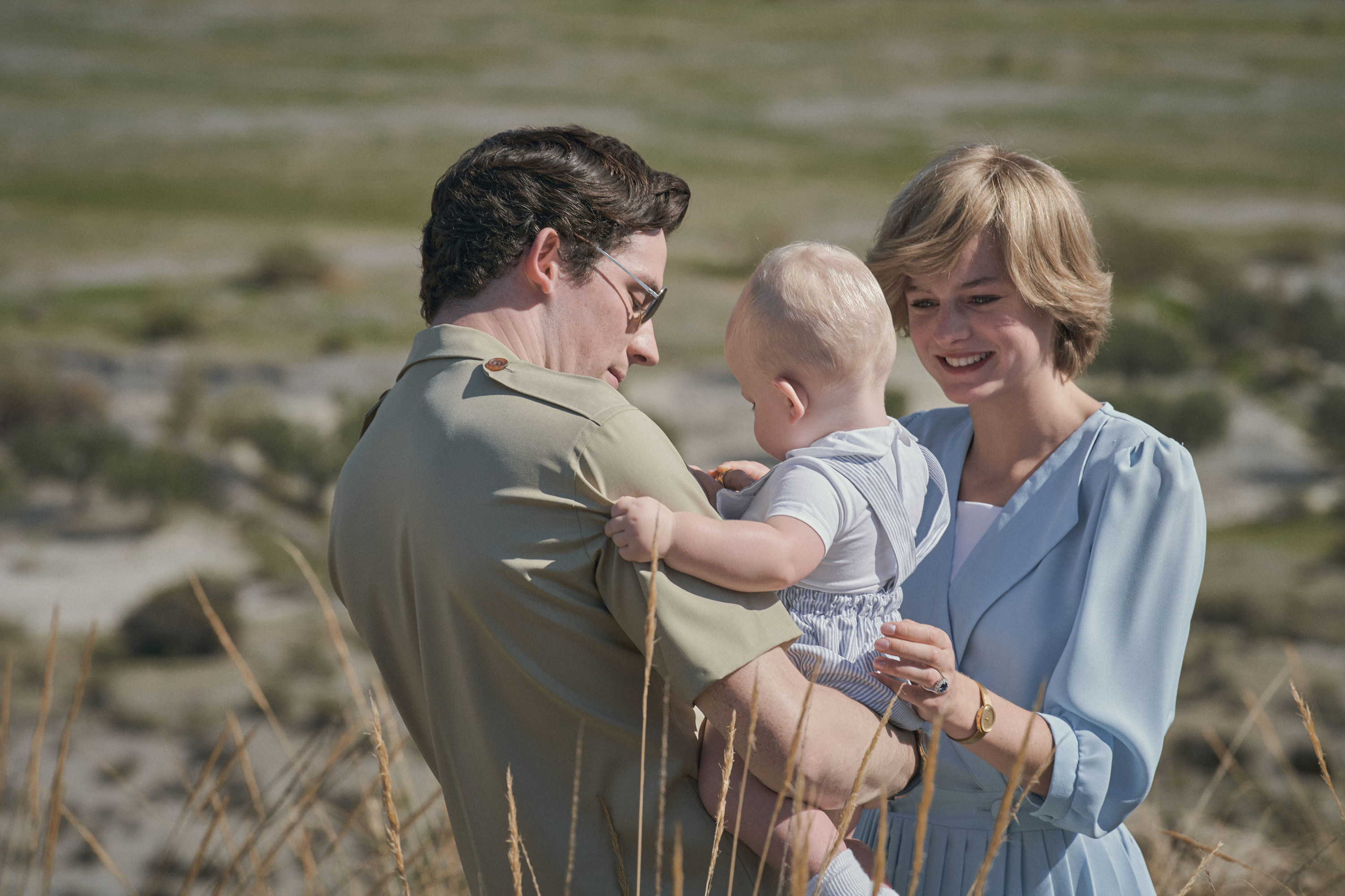 An image of Josh O&#x27;Connor (Prince Charles) and Emma Corrin (Princess Diana) and their infant son from season 4 of &quot;The Crown.&quot;