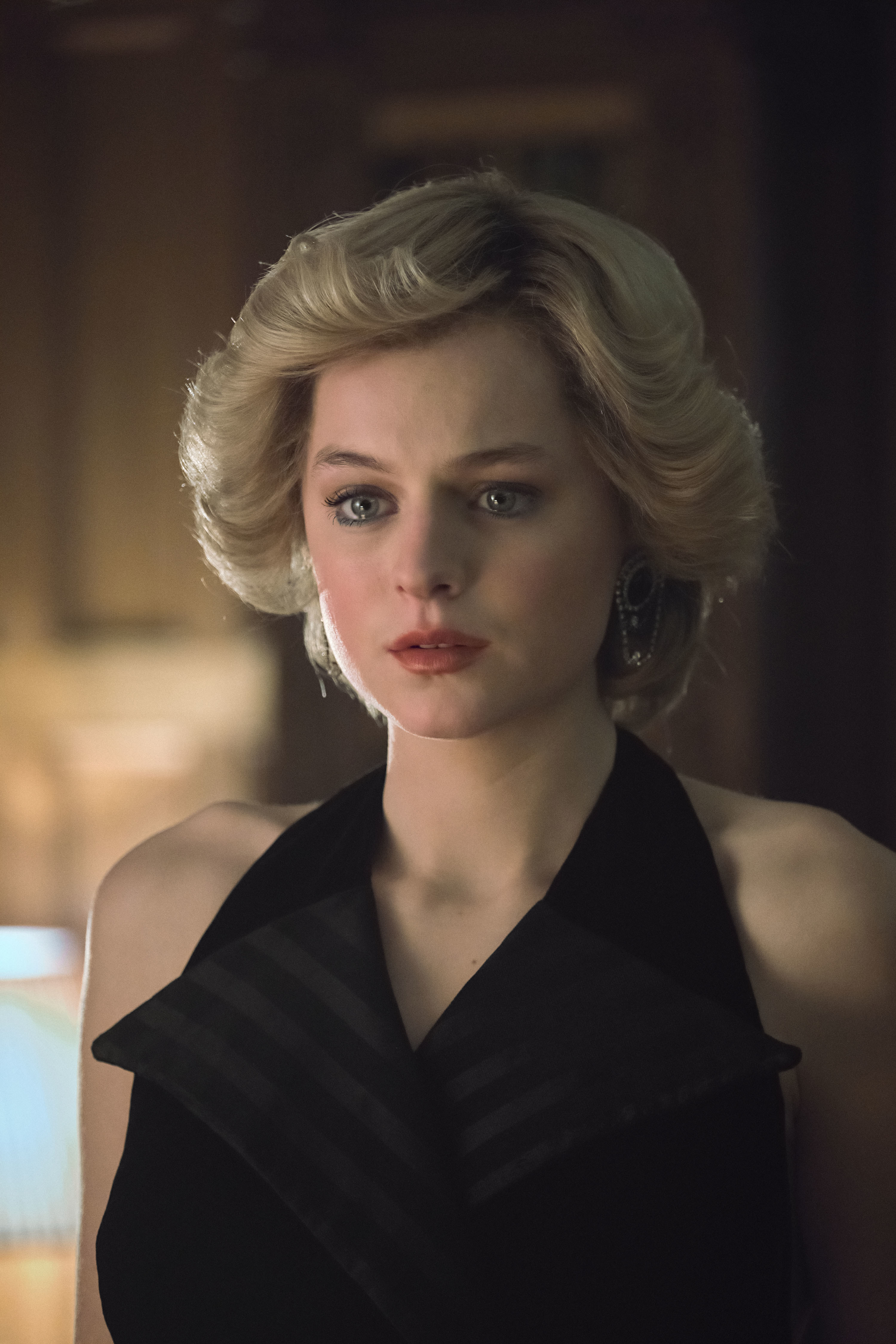An image of Emma Corrin (who portrays Princess Diana) with a tear in her eye in season 4 of &quot;The Crown.&quot;