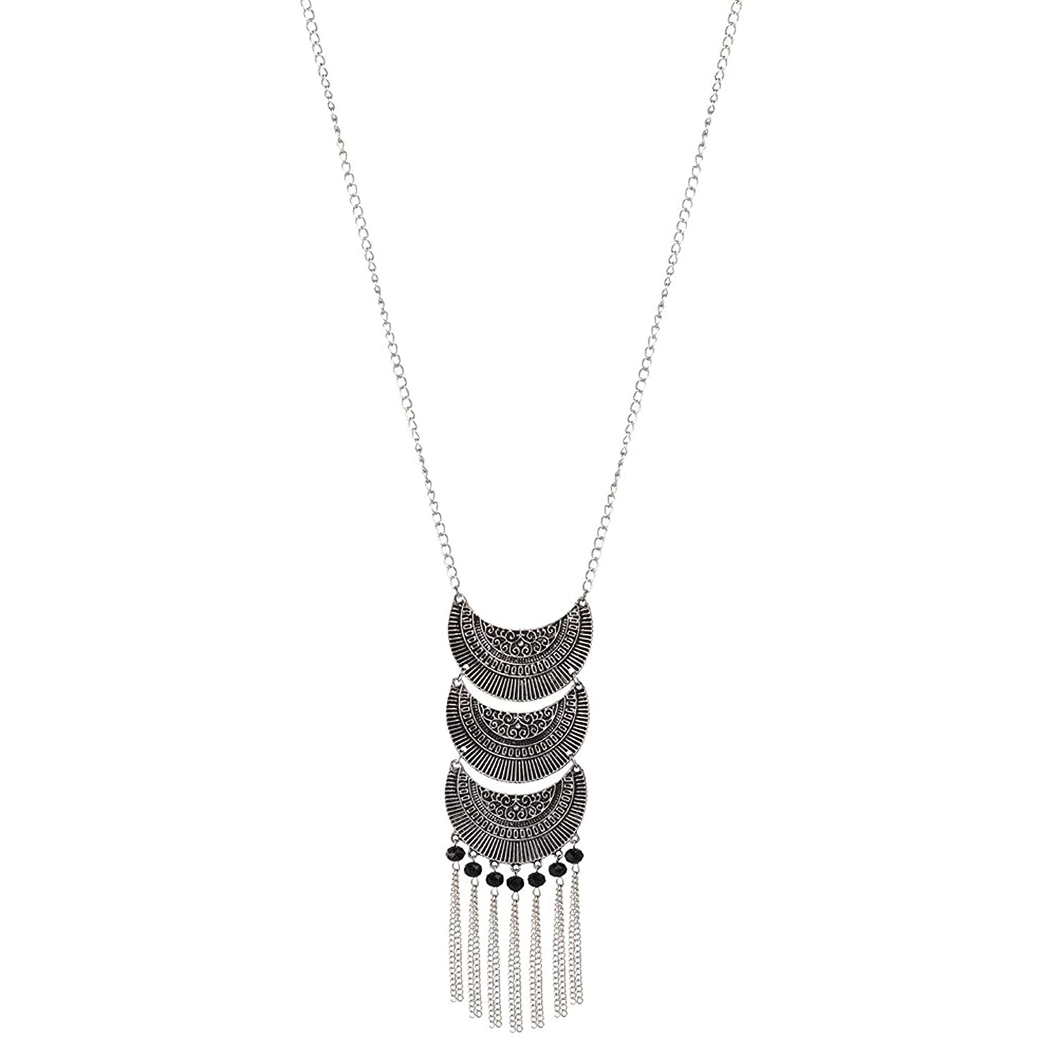 A long dangling necklace in black and oxidised metal.