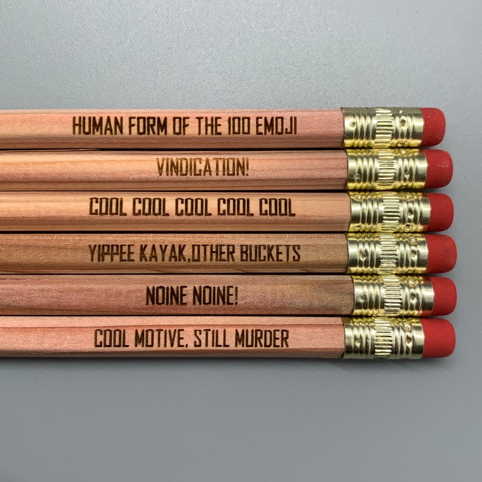 Pencil with quotes like &quot;vindication!,&quot; &quot;noine noine!&quot; and &quot;cool motive, still muder&quot;