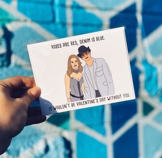 A white card with a drawing of Britney Spears and Justin Timberlake wearing denim outfits at the VMAs, with the words "Roses are red, denim is blue, it wouldn't be Valentine's Day without you" written around them