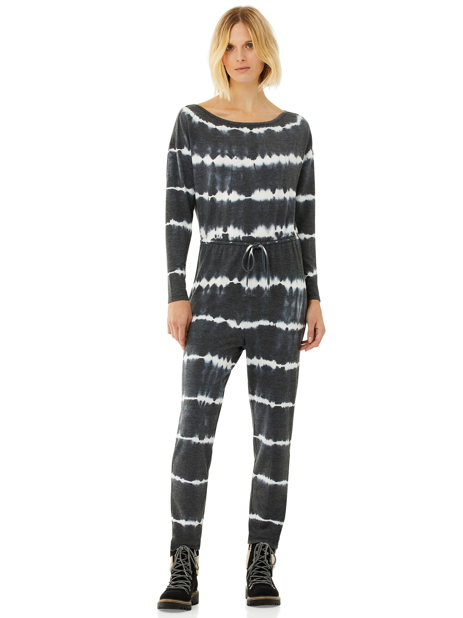 Model in tie dye jumpsuit 