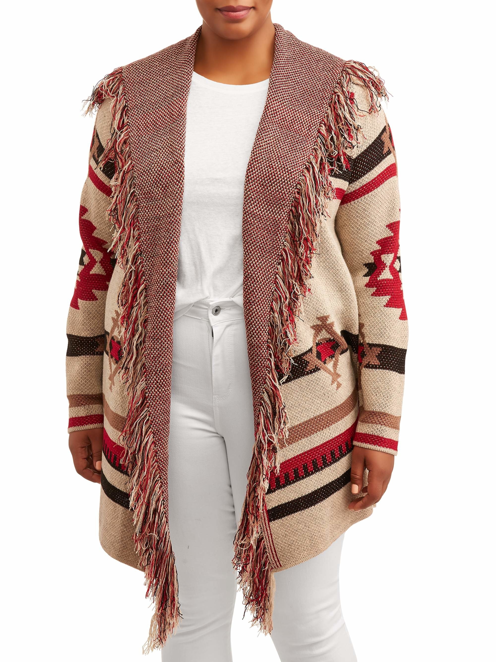 Model in jacquard open-front cardigan with fringe trim