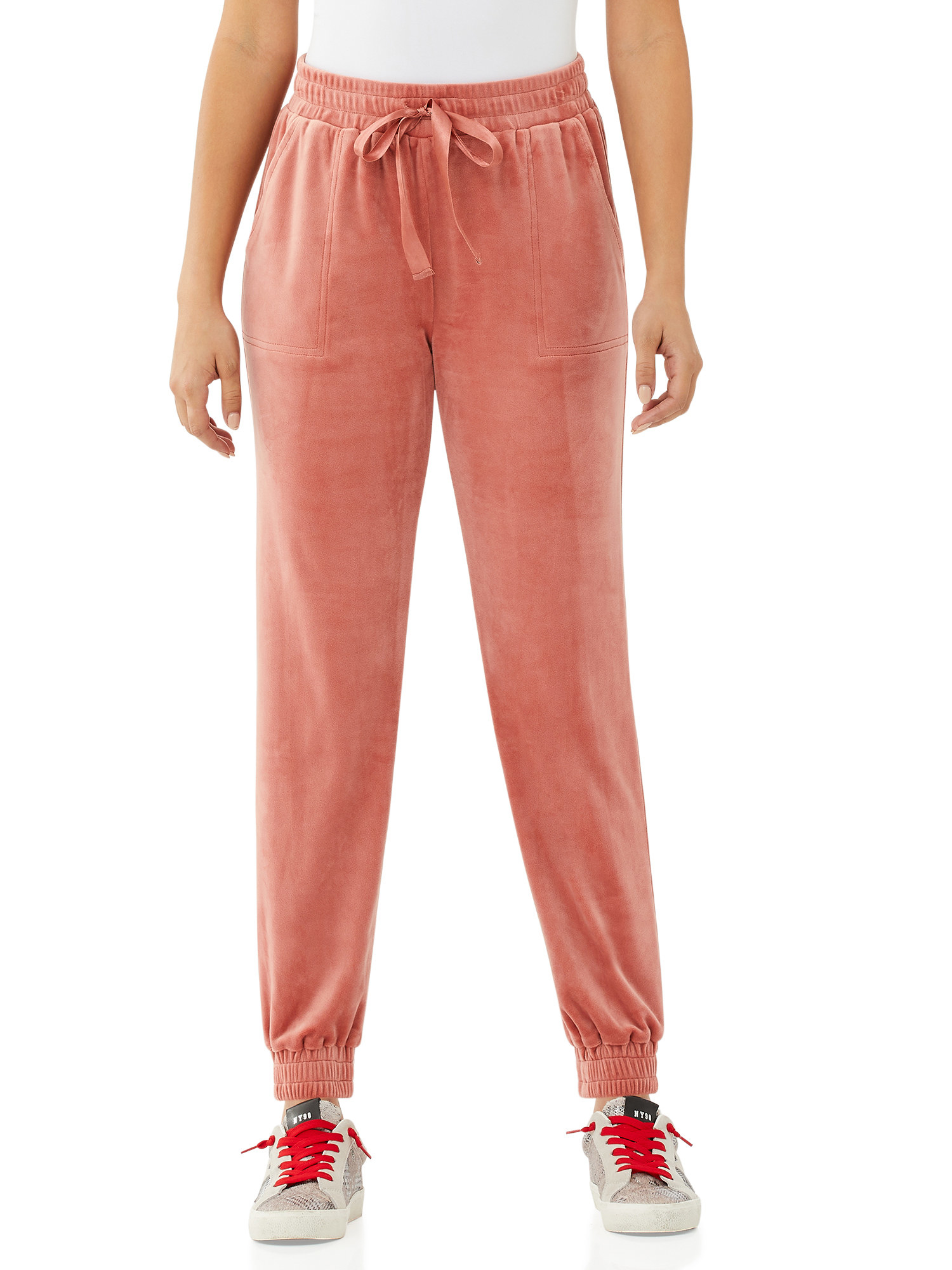 Model in velour joggers