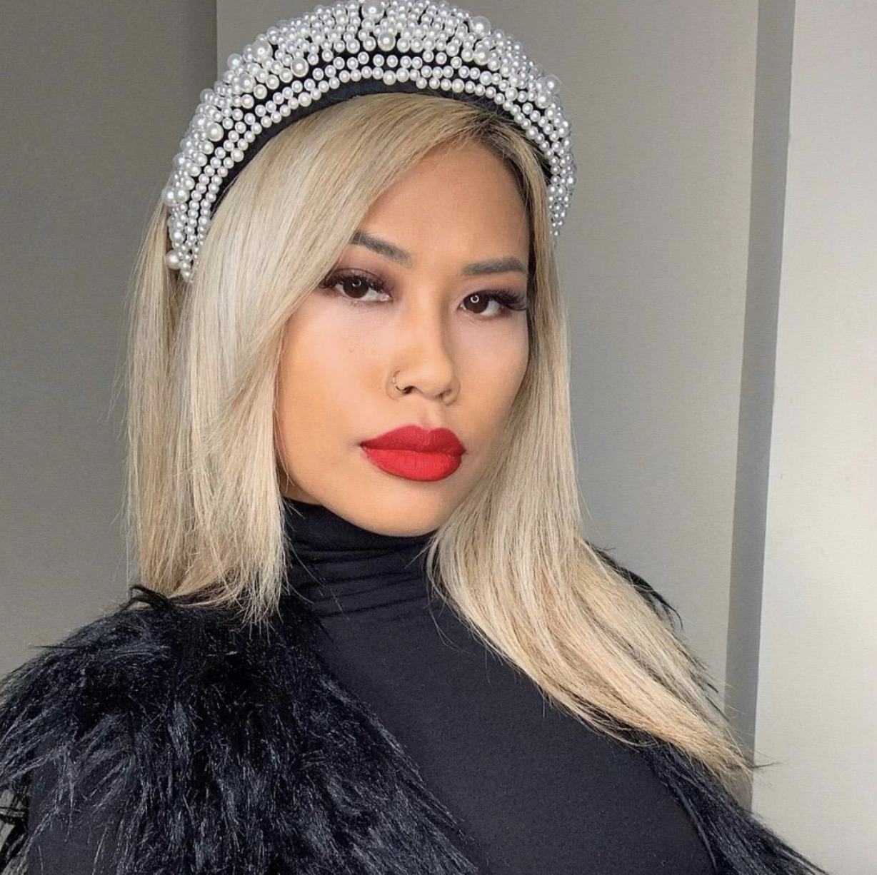 reviewer wearing the rhinestone padded headband 