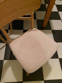 A reviewer's after photo which shows the chair completely cleaned