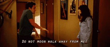 as Nick moonwalks, Jess tells him to stop moonwalking away from her
