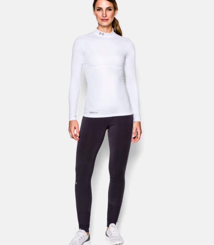 a model wearing the mock turtleneck shirt in white 