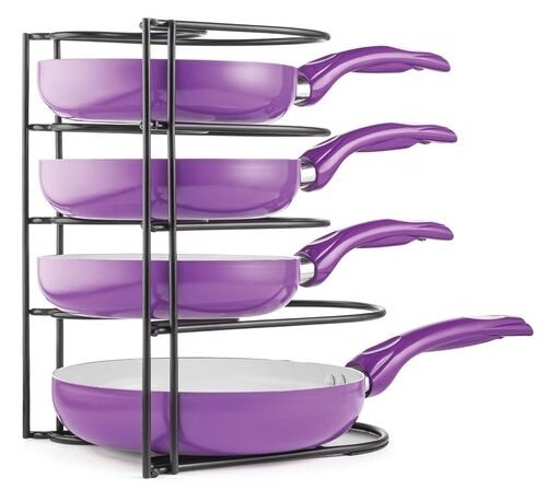 Metal rack with five shelves for storing pots and pans