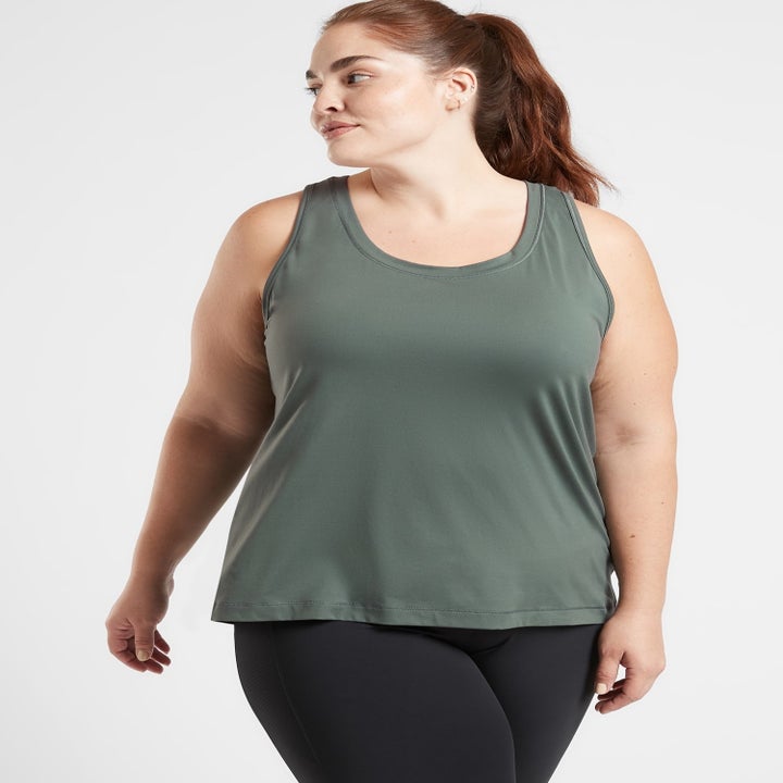 A model wearing the halter top in green