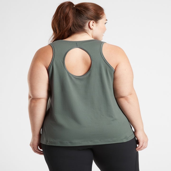 A model showing off the peephole behind the shirt