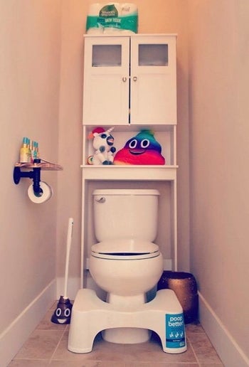 A reviewer's photo of the Squatty Potty set up in their bathroom