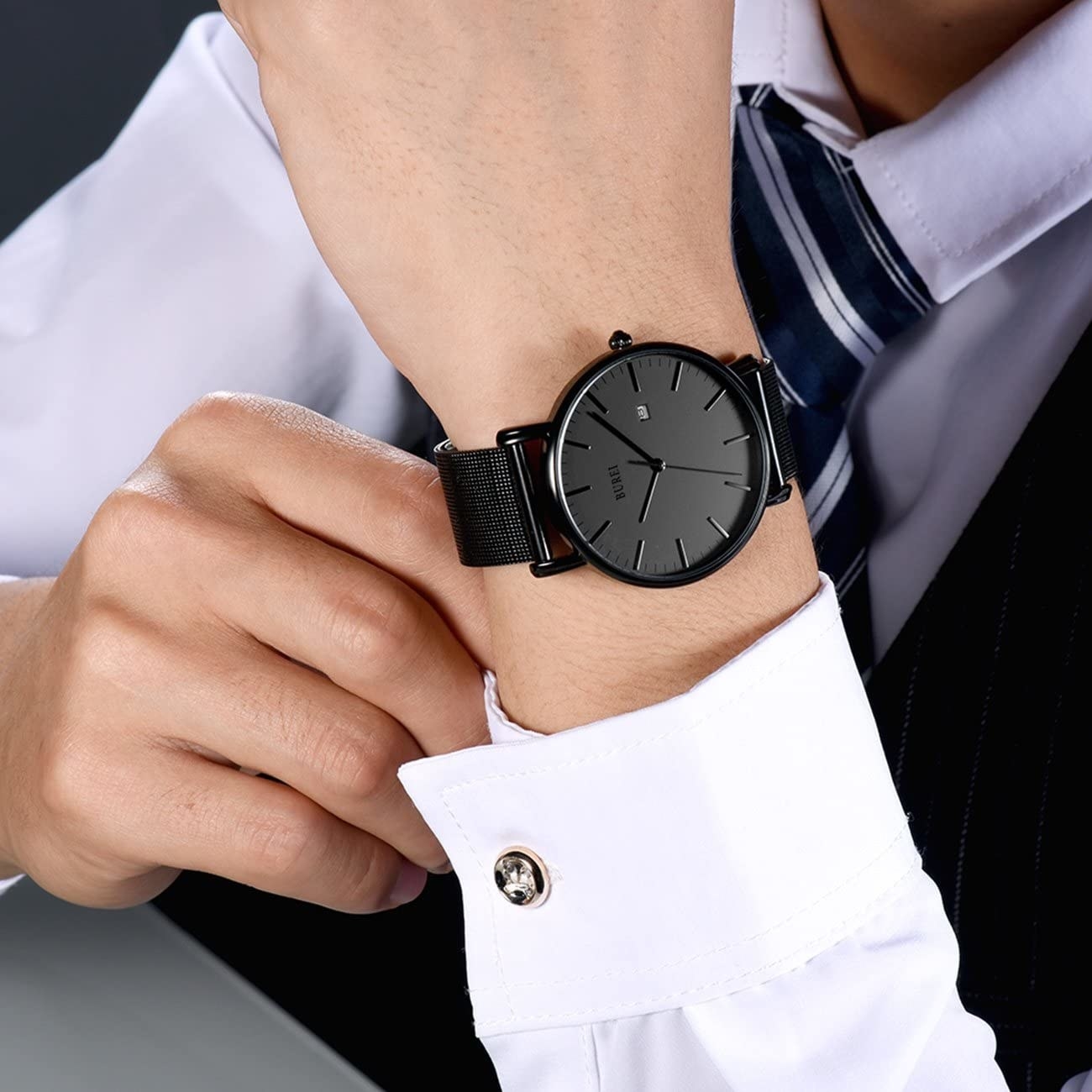 Model wears a black BUREI watch