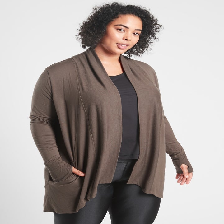 A model wearing the wrap in brown