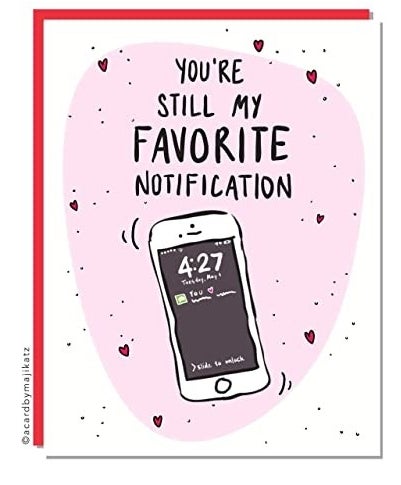 A white card with a drawing of a phone with notifications and "You're still my favorite notification" in type