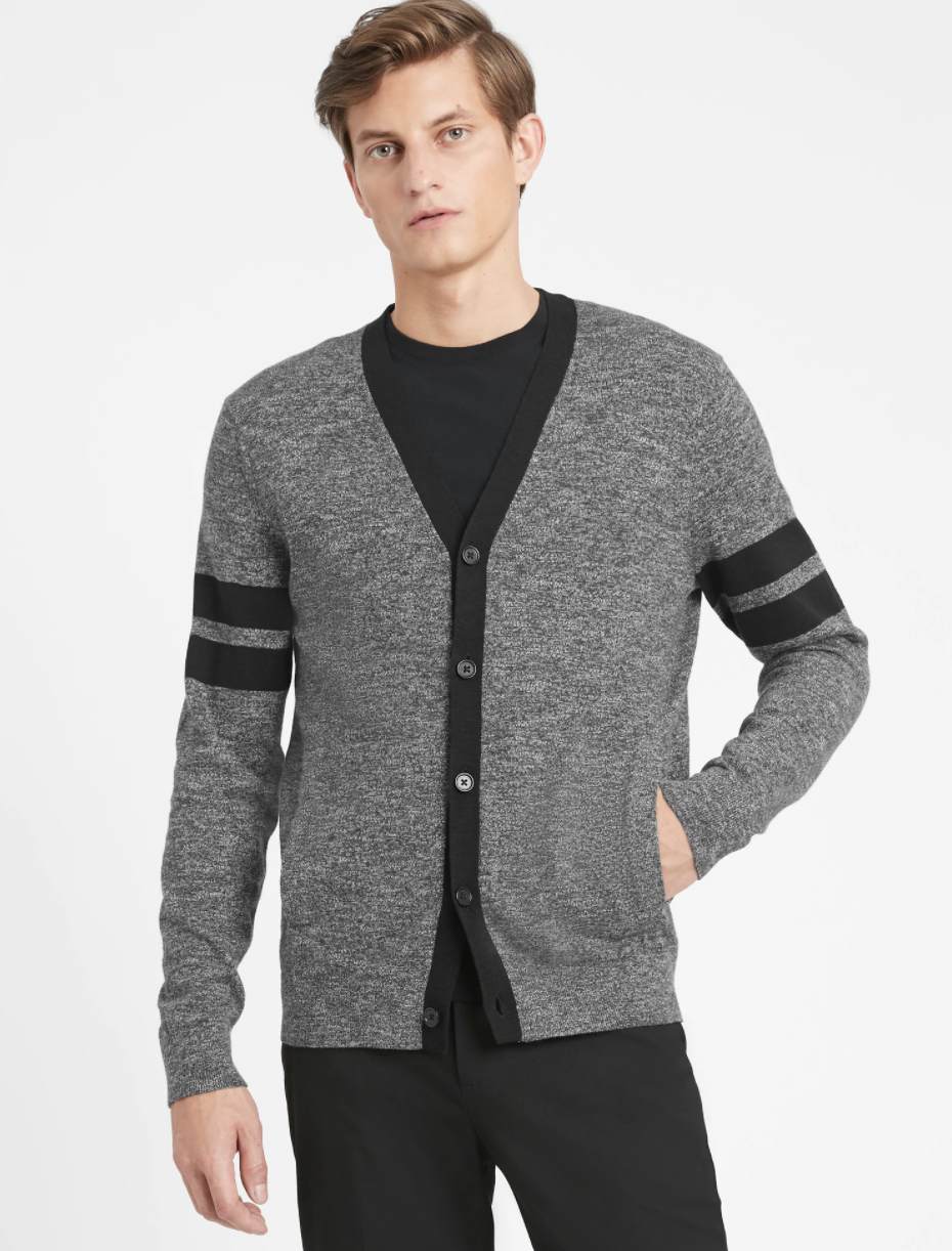 Model wearing cotton cardigan sweater in the shade charcoal gray