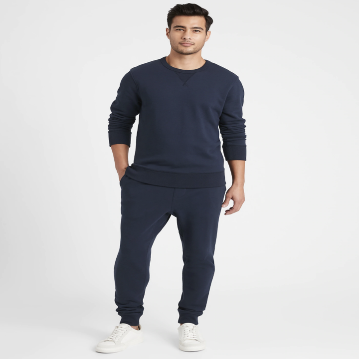 Model wearing French terry joggers in the shade navy