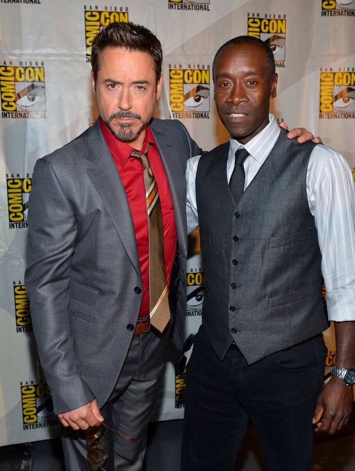 Robert Downey Jr. and Don Cheadle pose for a photo together
