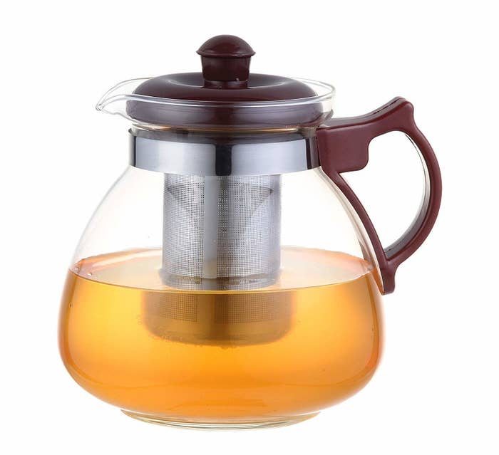 Tea infuser pot with tea in it