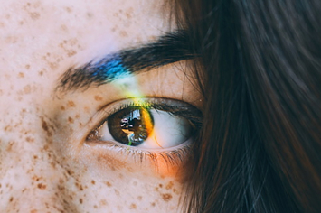An eye with a prism over it