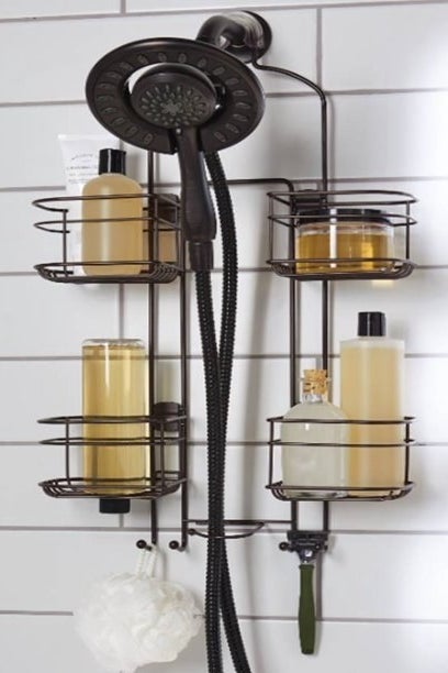 bronze shower caddy with various bottles