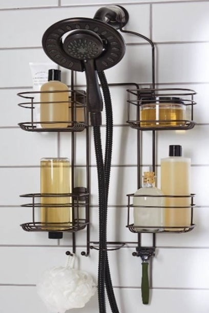 bronze shower caddy with various bottles