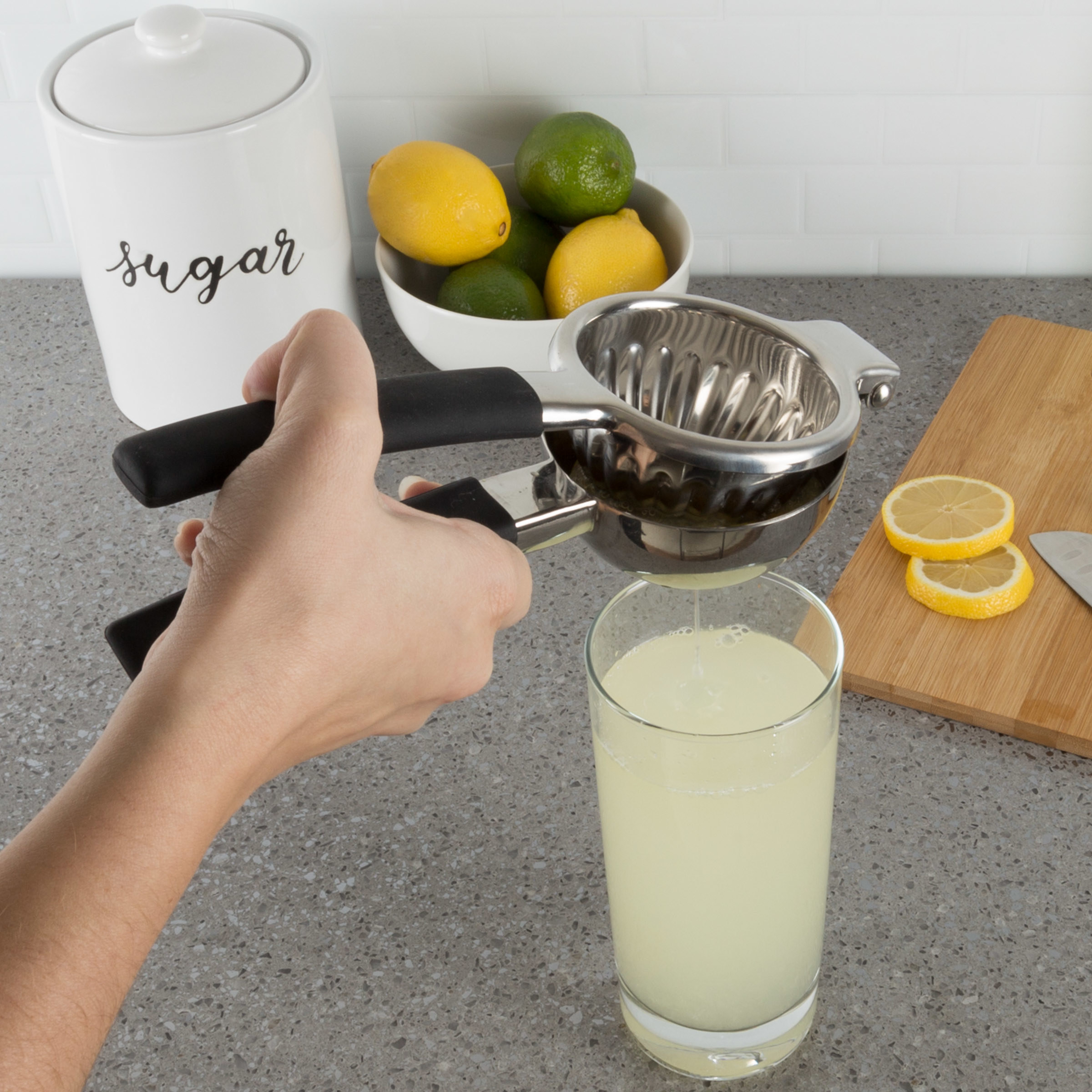 stainless steel juicer juicing lemon