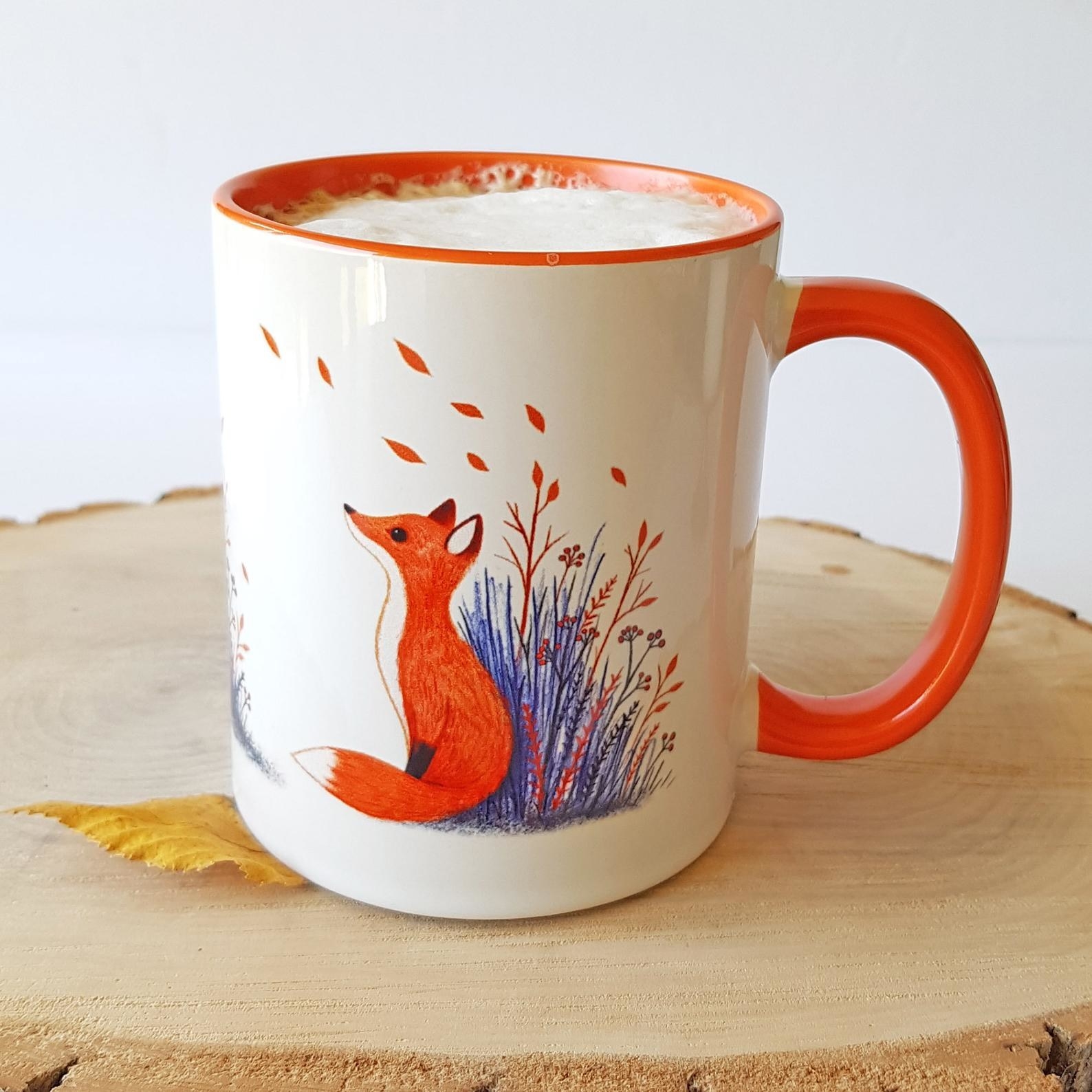 White mug with fox and flower illustration