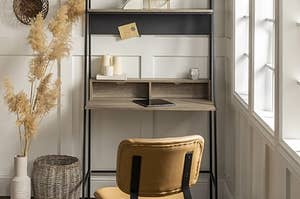 Metal desk frame with manufactured wood desktop and shelving