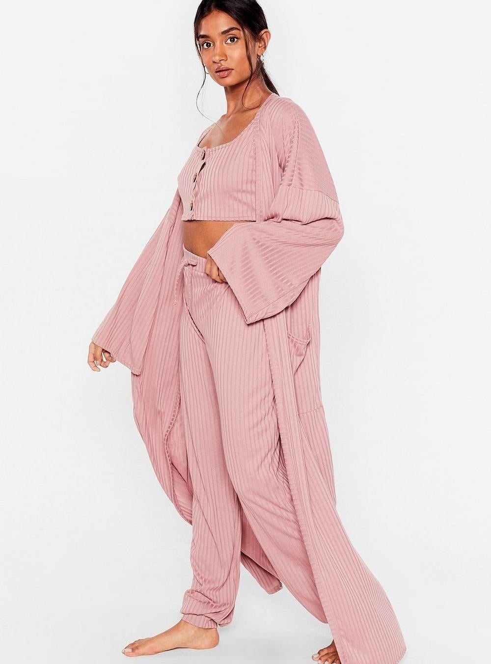 A person wearing the ribbed three-piece lounge set