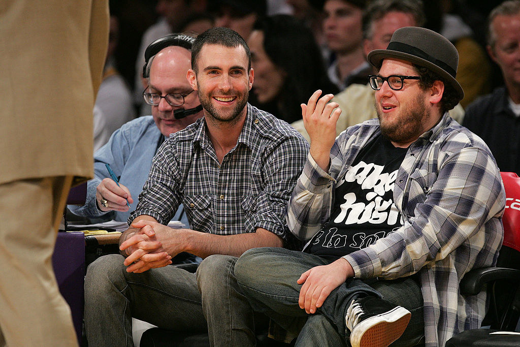 Adam Levine and Jonah Hill sitting court-side at a Lakers game in 2008