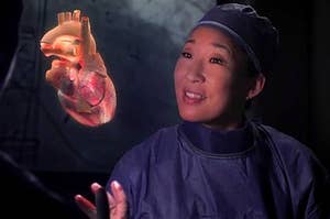Cristina Yang looking at a 3-D heart 